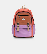 A color-blocked backpack by headster, featuring a terracotta orange top half, a lavender purple bottom half, and tan webbing straps and handle, shown against a light gray background.