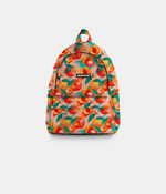 A Headster backpack featuring a colorful fruit print with peaches and green leaves on an orange background, shown against a light gray studio backdrop.