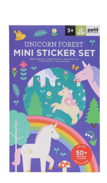 Front of a 'Unicorn Forest Mini Sticker Set' package by Petit Collage, featuring colorful cartoon unicorns, trees, flowers, and a rainbow on a purple background.
