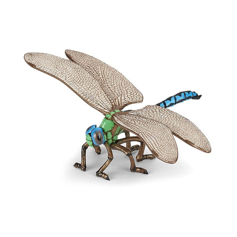 Toy dragonfly with detailed wings on a white background