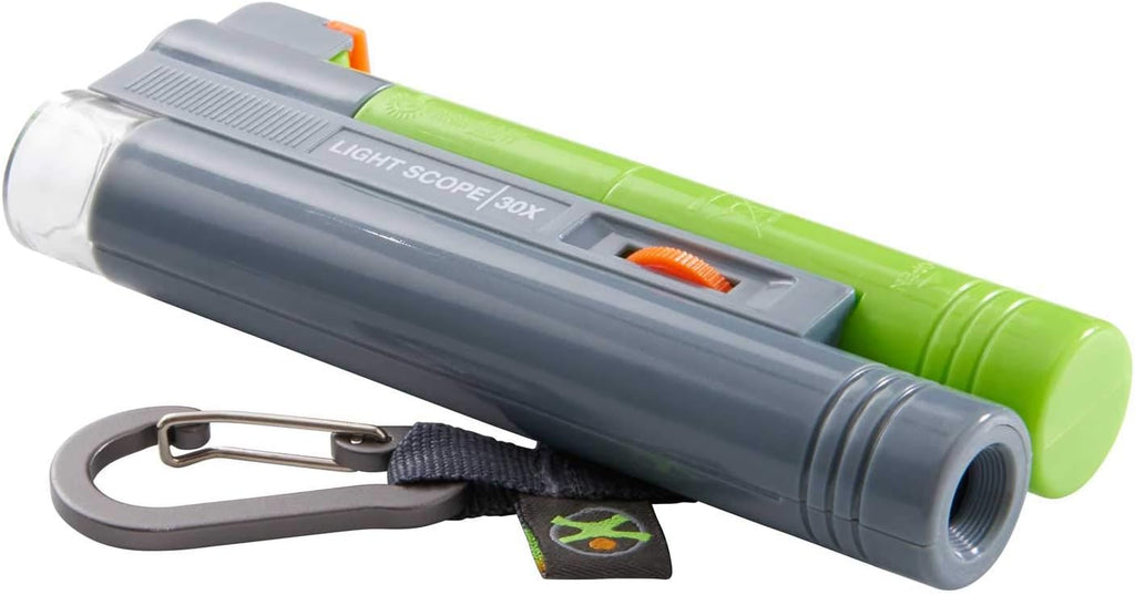 Gray and green flashlight with carabiner on a white background