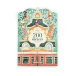 Moulin Rose 'The Magic of 200 Stickers' sticker book cover, featuring a whimsical illustration of a building with animals in trees and a red train at the bottom.