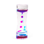 Glass container with colorful liquid and beads on a white background