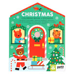 Christmas-themed coloring book and stickers with animals and a door illustration on a green background.