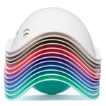 Stack of colorful plastic shells on a white background