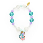 a bracelet with blue, purple and white acrylic beads with a mermaid charm on a white background