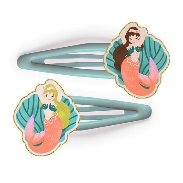 on a white background, two greyish blue metal clips with coral colored white acrylic mermaids one with blonde hair, one with brown hair