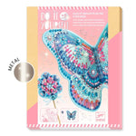 Decorative butterfly kit packaging with colorful design on a white background