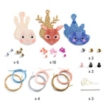 Decorative animal head accessories with small items on a white background