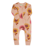 Dusty rose baby onesie with pink and yellow sunflower pattern on a white background
