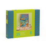 A blue and green box on a white background with a bright green sleeve depicting the finished project.