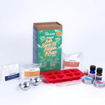 Bath Bomb Kit with packaging, molds, and ingredients on a white background