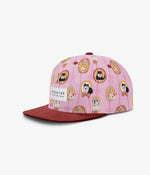 Pink ball cap with a pattern of victorian style portraits of illustrated cats and a corduroy brim on a white background