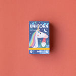 Unicorn-themed puzzle box on a red background