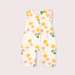 Floral-patterned baby romper on a light gray background