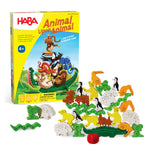 An illustrated yellow box with animals piled up on the front. A pile of wooden game pieces is on the front of the box on a white background.