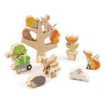 Set of wooden animal toys on a white background