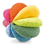 A rainbow fabric ball with colourful sections on a white background