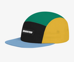a side view of a 5 panel cap on a white background with each panel a different colour: blue brim, yellow, green and black panels