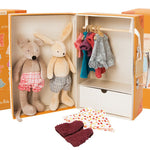 on a white background, A picture of an open suitcase-style box with two plush animals wearing undershorts on one side, and on the other side a hanging bar with clothing and a drawer that can be opened. Two peices of clothing are at the forefront.