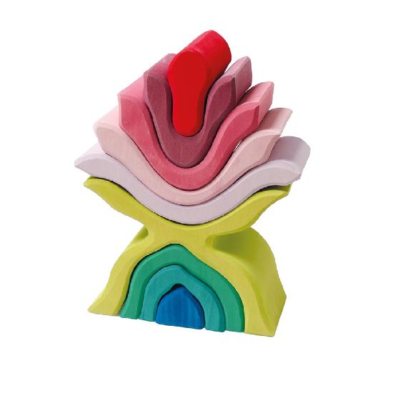 Wooden Lotus flower stacker in red, pink, purples, greens and blue on a white background