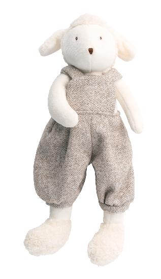 A plush sheep on a white background dressed in dressed in light brown baggy tweed overalls.