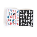 On a white background, an open book with colour and black and white illustrations