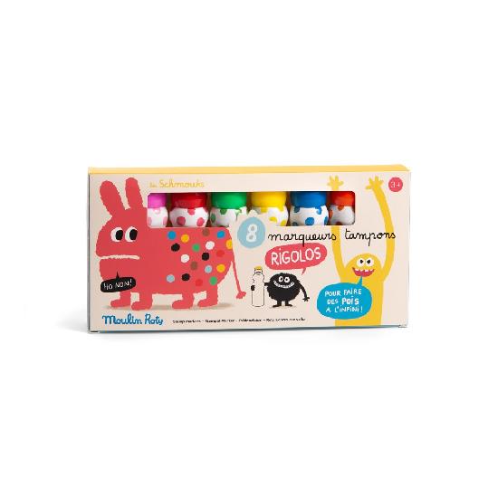 set of colourful markers in a rectangular box on a white background. Box has illustrated friendly monsters on them in various colours