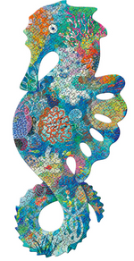 A green and blue seahorse puzzle covered in coral and other underwater plants on a white background.