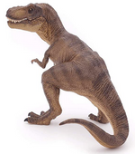a realistic brown tyrannosaurus rex dinosaur figurine with a closed mouth on a white background