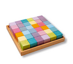 on a white background, a set of colourful pastel wooden cubes in a natural wood tray.